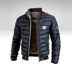 Navy Ridgeway jacket shown open with the quilted lining and stand collar